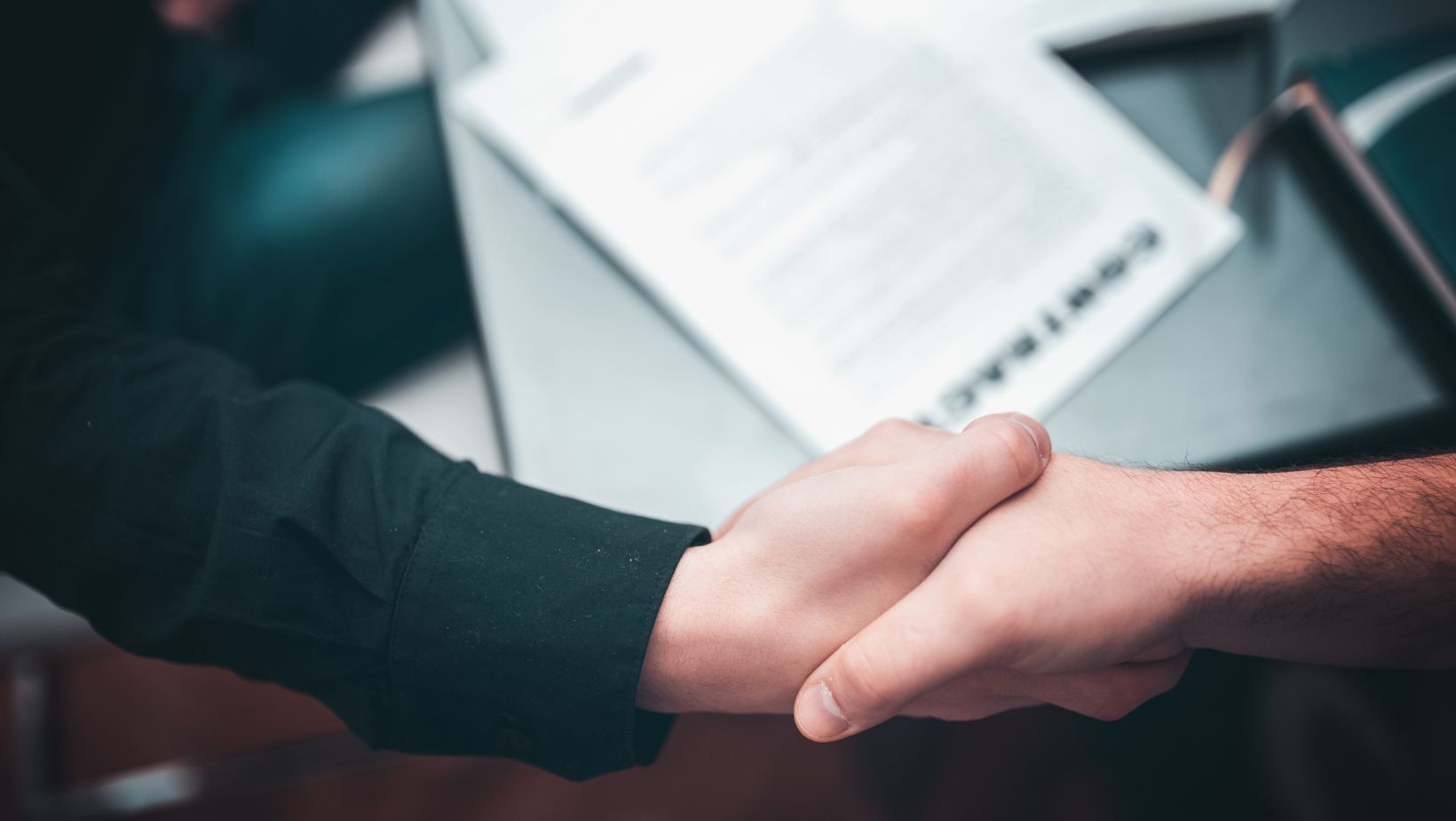 two people shaking hands